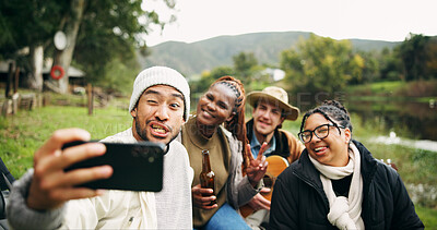 Buy stock photo Selfie, relax and funny face with friends in nature for social media post, beer or profile picture. Holiday, photography memory and vacation with group of people and guitar outdoor for trip and drink