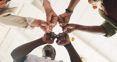 Buy stock photo Below, business and people with fist bump in office for good news, real estate success and celebration. Meeting, huddle and staff achievement for property deal, team motivation and auction milestone 