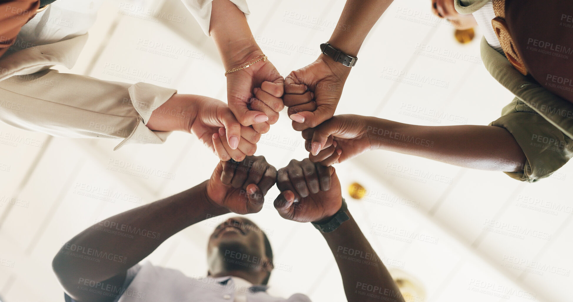 Buy stock photo Below, business and people with fist bump in office for good news, real estate success and celebration. Meeting, huddle and staff achievement for property deal, team motivation and auction milestone 