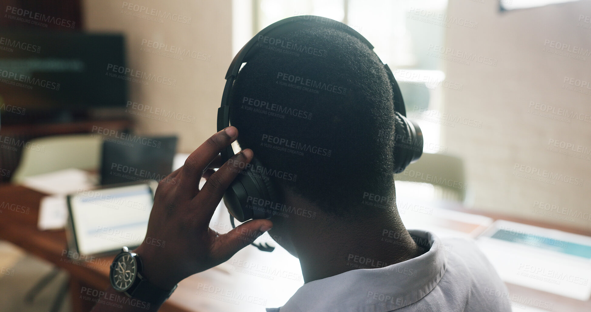 Buy stock photo Headset, contact and businessman in office for online consultation on property listing with feedback. Discussion, mic and back of real estate agent with tech for price negotiation, offer or review.