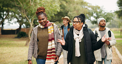 Buy stock photo Talking, travel and hiking with friends in nature for eco vacation, adventure and weekend break. Trekking, winter holiday and sustainability tourism with people outdoor for explore, walk and trip