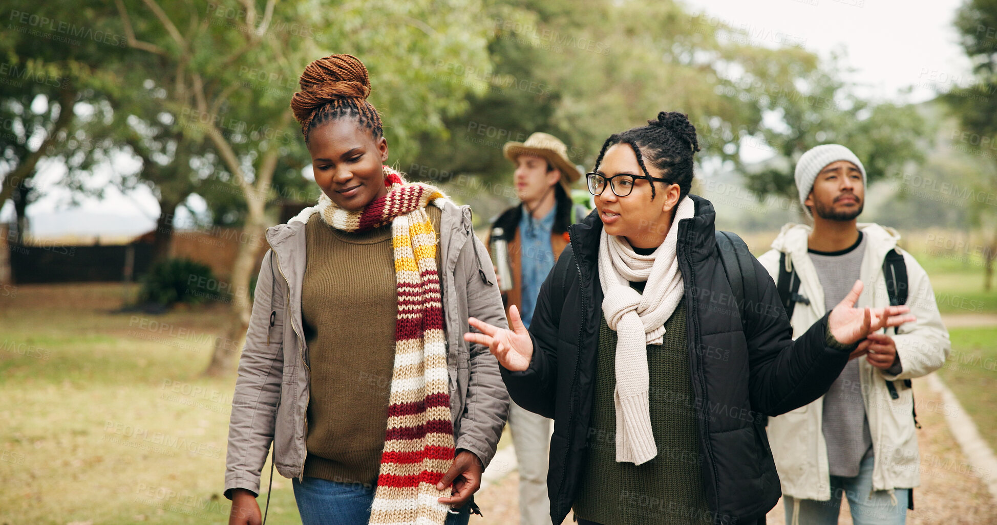 Buy stock photo Talking, travel and hiking with friends in nature for eco vacation, adventure and weekend break. Trekking, winter holiday and sustainability tourism with people outdoor for explore, walk and trip