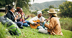 Camping, friends and people with guitar, outdoor and bonding together for reunion, holiday and singing. Happy, musician or group in woods, vacation and string instrument for song, relax and listening