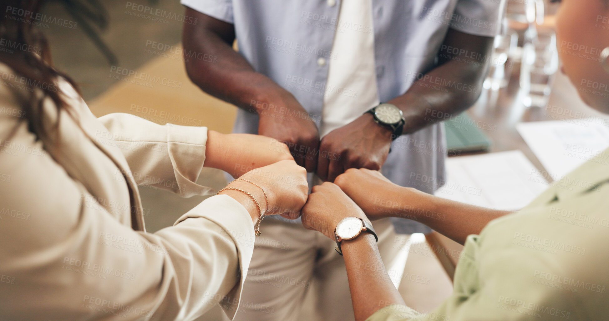 Buy stock photo Hands, business and people with fist bump in office for good news, real estate success and celebration. Huddle, gesture and staff achievement for property deal, team motivation and auction milestone 