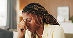 Stress, anxiety and woman with headache on sofa with discomfort, temple pressure or mental fatigue. Worry, black girl or migraine in home with burnout, brain fog and overwhelmed by uncomfortable ache
