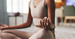 Woman, hands and yoga in apartment with meditation, spiritual awareness or peace for holistic health. Zen, female person and mindfulness exercise in home with lotus pose, introspection and wellness.