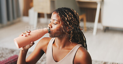 Buy stock photo Yoga, woman and drinking water in apartment with break, wellness or natural detox for holistic health. Thirsty, black person and exercise rest in home with bottle, nutrients or beverage for hydration