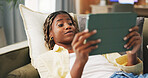 Surprise, home or black woman on couch, tablet for social media or reaction for post. Apartment, tech or African person in lounge, connection for online gossip, news story or shocked for website info