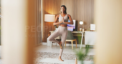 Buy stock photo Zen, woman and yoga in living room with meditation, spiritual awareness and fitness for holistic health. Space, black person and balance exercise in house with tree pose, mindfulness and wellness.