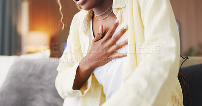Buy stock photo Hands, discomfort and woman with chest pain on sofa for heart attack symptoms, hypertension and risk. Health, female person and artery pressure in home for cardiac arrest, medical emergency or angina
