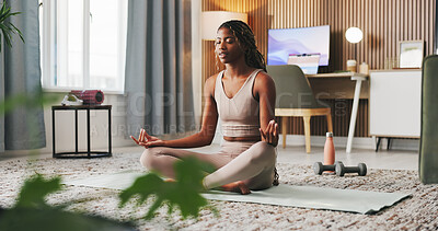 Buy stock photo Zen, yoga and black woman in house with meditation, spiritual awareness and peace for holistic health. Calm, person and mindfulness exercise in living room with lotus pose, wellness or introspection.