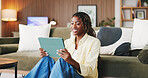 Happy, girl and reading on tablet in home for university portal, study registration or research. Student, black person and smile with tech for college enrollment, scholarship application or admission