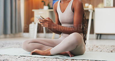 Buy stock photo Hands, health and phone with woman in home for communication, fitness app and break. Social media, yoga pose search and connection with person and mobile in living room of house for wellness