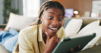 Buy stock photo Surprise, winner and tablet with black woman on sofa in home for online casino prize, success and bonus. Connection, jackpot profit and app with person in living room of house for achievement