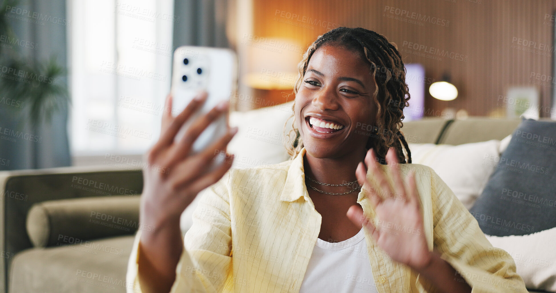 Buy stock photo Black woman, phone and smile with video call at house, wave and greeting on web in living room. African person, smartphone and happy with mobile app, talk or virtual contact on social media at home