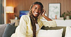 Happy, smile and portrait of black woman on sofa with good mood, relax and positivity on break. Apartment, couch and person with confidence, pride and calm on weekend for me time, rest and peace