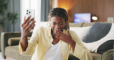 Buy stock photo Black woman, phone and laugh with video call in home, joke and funny story on floor in living room. African person, smartphone and happy with mobile app, talk or virtual chat on social media at house