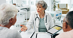 Tablet, consultation and doctor with senior couple in hospital for medical diagnosis with research. Checkup, digital technology and healthcare worker with elderly people for discussion in clinic.