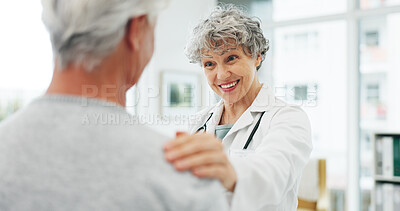 Buy stock photo Consultation, healthcare and doctor with senior woman in hospital for advice in discussion. Happy, professional and medical worker with elderly female patient for help at checkup in clinic office.