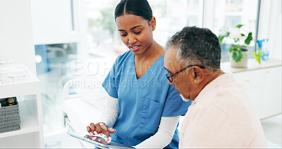 Buy stock photo Hospital, man and nurse with tablet for questions, assessment or exam on bed. Digital tech, health insurance and senior person with caregiver in consultation for medical advice, test and support
