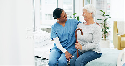 Buy stock photo Walking stick, hug and nurse with senior woman in hospital for conversation, comfort or support at checkup. Smile, trust and medical caregiver with elderly patient embracing at consultation in clinic