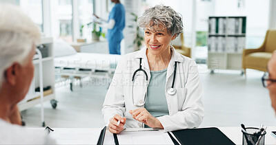 Buy stock photo Happy, doctor and old couple in clinic, consultation for diagnosis and feedback for symptoms. Medical service, senior man or woman in hospital, physician or healthcare info for recovery or smile