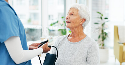 Buy stock photo Nurse, old woman and blood pressure test in hospital for hypertension, healthcare checkup and exam. Assessment, people and monitor heart health with senior patient for cardiovascular wellness