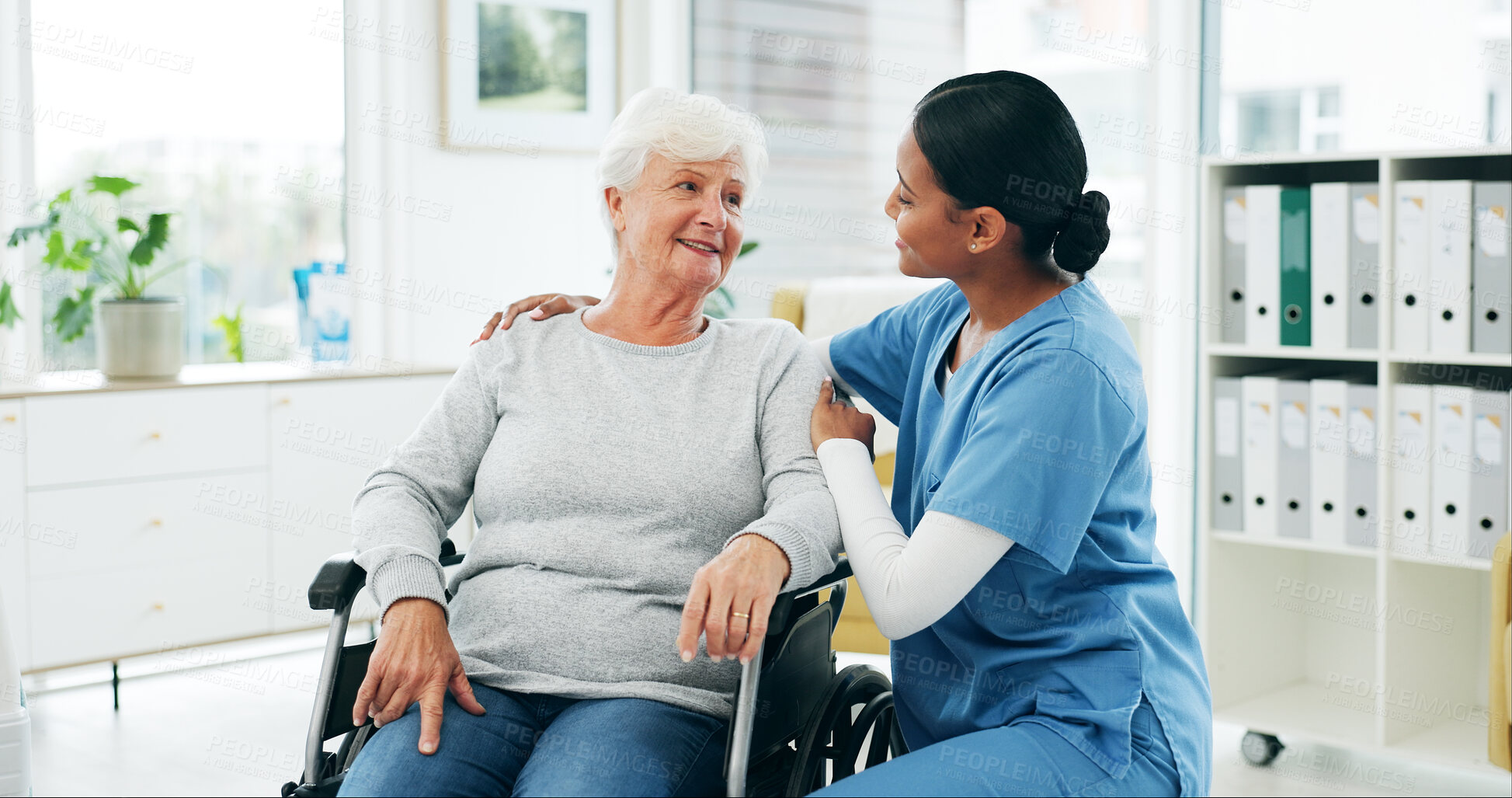 Buy stock photo Embrace, nurse and old woman in hospital with wheelchair, empathy or support in healthcare checkup. Retirement, gp and person with disability, kindness and patient connection in medical consultation.