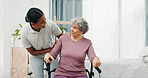 Old woman, physiotherapist and smile in wheelchair at clinic with good news, discussion and recovery. Elderly person with disability, happy and conversation with rehabilitation at wellness center