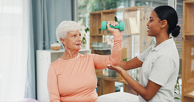 Buy stock photo Clinic, weights and old woman with exercise in physio for rehabilitation, bone strength or guidance. Health, expert and senior patient with dumbbells for muscle recovery, arthritis or healing support