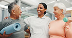 Hug, happy and physiotherapist with senior couple at clinic for rehabilitation or exercise. Smile, medical and healthcare worker embracing elderly people for recovery with weight in physical therapy.