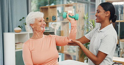 Buy stock photo Clinic, physio and senior woman with dumbbells for mobility exercise, rehabilitation and guidance. Health, professional and old patient with weights for physical therapy, arthritis or healing support