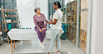 Old woman, physiotherapy and feedback with clipboard, documents or good news for healing at clinic. Happy people, elderly patient and healthcare report for rehabilitation, consultation or recovery
