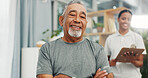 Consulting, smile and physiotherapy with old man in office for healthcare, rehabilitation and orthopedic help. Physical therapy, chiropractic recovery and portrait of person in clinic for support