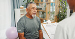 Old man, physiotherapy and paperwork with clipboard, smile or nutrition facts for healing at clinic. People, patient and healthcare professional with report, feedback and consultation with diet info