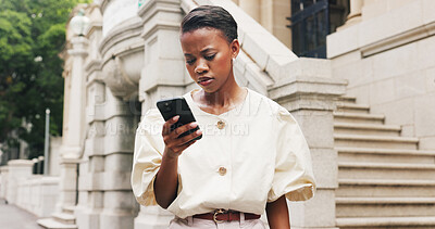 Buy stock photo Message, review or black woman in town with communication, agenda change or email response on commute. Texting, networking or employee with tech, schedule update or digital connection in city travel.