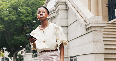 Buy stock photo Waiting, phone and business woman on city street, digital lift request and transport app for commute. Outdoor, mobile and black person with patience at pickup point, track arrival and search for ride