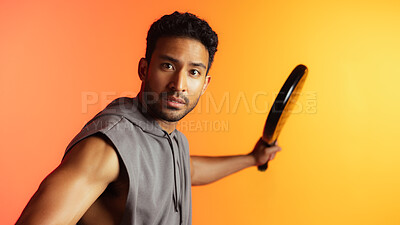 Buy stock photo Swing, racket and padel with portrait of man for serve, sports athlete and fitness practice. Competition tournament, tennis match challenge and training with person on studio background for exercise