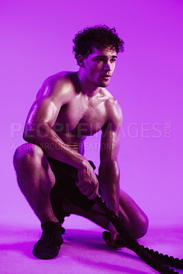 Buy stock photo Tired, man and battle rope for fitness in studio background with vision, exercise and endurance recovery. Sweating, shirtless and person with fatigue, resilience training and workout break for health
