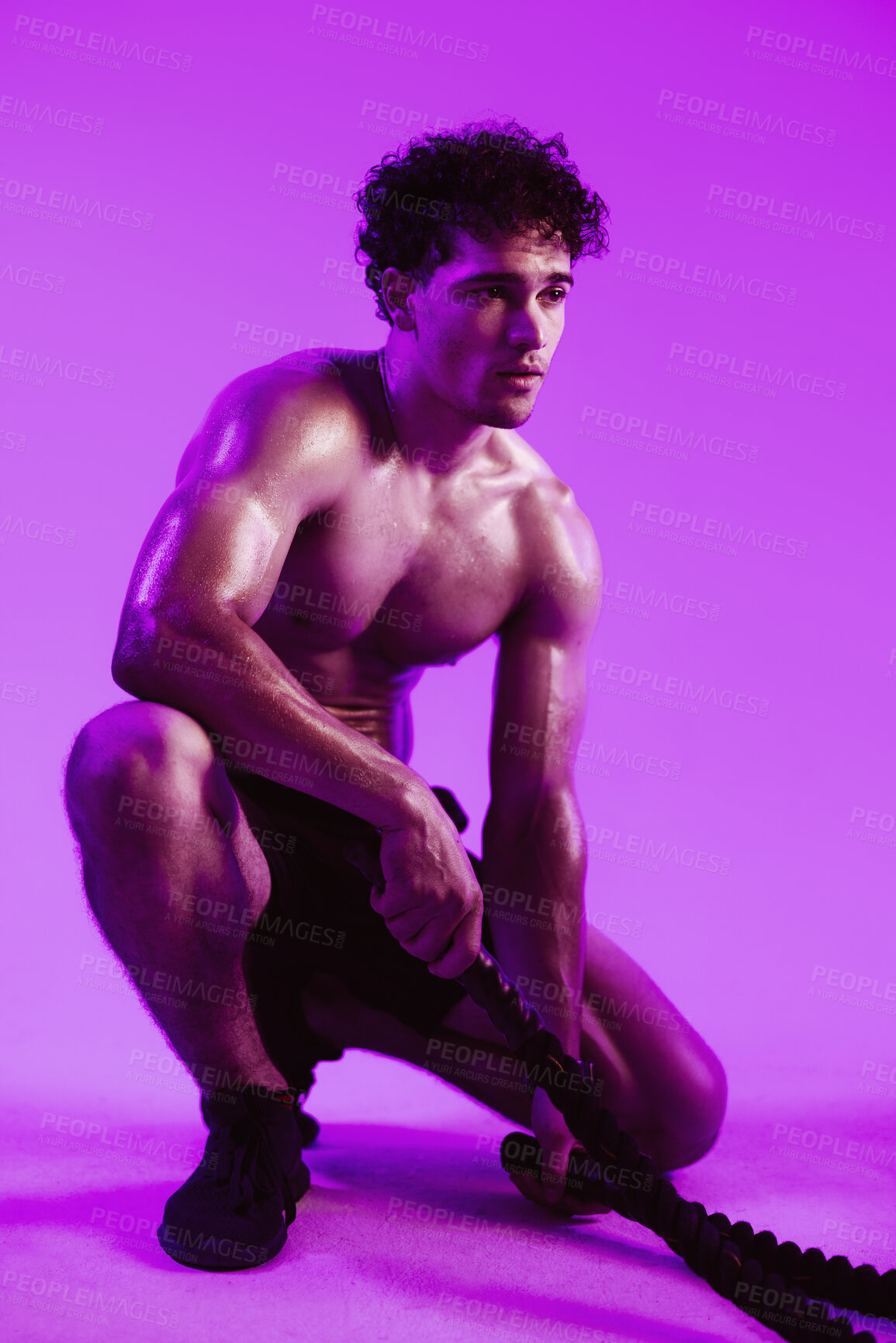 Buy stock photo Tired, man and battle rope for fitness in studio background with vision, exercise and endurance recovery. Sweating, shirtless and person with fatigue, resilience training and workout break for health