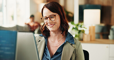 Buy stock photo Review, glasses or journalist in office with computer, draft edit or source feedback for article. Reading, woman or copywriter in newsroom with tech, fact check or industry research for publication.