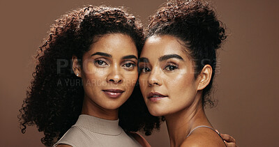 Buy stock photo Portrait, skincare and women with confidence in studio, natural cosmetics and support for wellness glow. Dermatology, friends and people with self care for facial shine, beauty and brown background