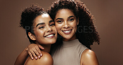 Buy stock photo Portrait, skincare and women in studio with hug, natural makeup and bonding for beauty aesthetic. Happy, female friends and embrace with dermatology, wellness and glowing skin on brown background.