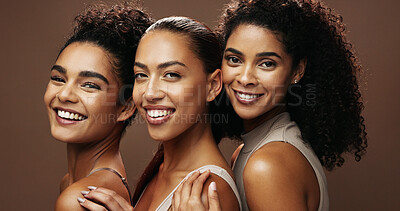 Buy stock photo Portrait, happiness and women with makeup for beauty, group or self care with cosmetics for wellness. Studio background, sisters and people with smile for skincare, embrace and dermatology in Brazil