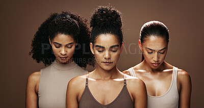 Buy stock photo Skincare, beauty and women in studio for cosmetics, makeup and cosmetology for glow. Salon, spa and people with eyes closed for wellness, dermatology or natural texture on brown background with shine