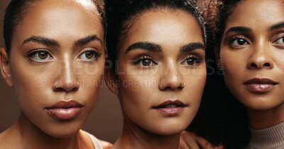 Buy stock photo Women, skincare or thinking with beauty in studio for spa, makeup or salon on a brown background. Face, female people or glow up in row or line with shine or empowerment for cosmetics or cosmetology