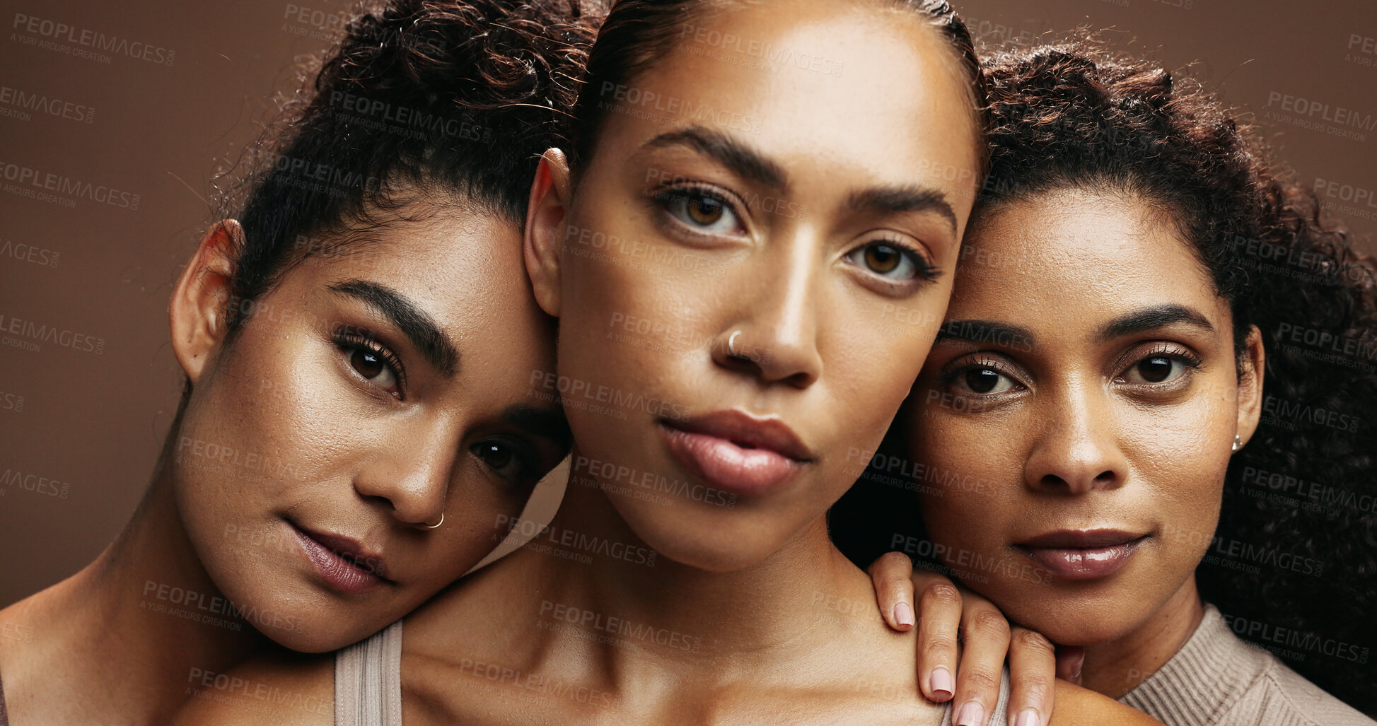 Buy stock photo Women, skincare or portrait with makeup in studio for beauty spa or salon on a brown background. Group, female people or face with glow up, shine or multi skin tone for facial or cosmetics together