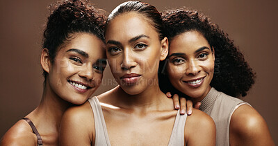 Buy stock photo Happy women, skincare or portrait with makeup in studio for beauty spa on a brown background. Group, female people or model with glow up, shine or empowerment for facial salon or cosmetics together