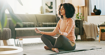 Buy stock photo Yoga, lotus pose and woman in home for breathing, balance or wellness in living room. Calm, health and female person with meditation exercise for relax, zen or self care for healing on mat in house.