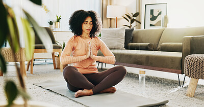 Buy stock photo Prayer hands, meditation and woman in home for calm, peace and health in morning for balance. Wellness, namaste and female person with yoga pose for relax, zen or mindfulness in living room at house.